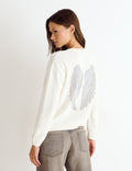Wing studded back sweater