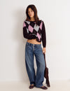 Asymmetrical diamond-patterned sweater