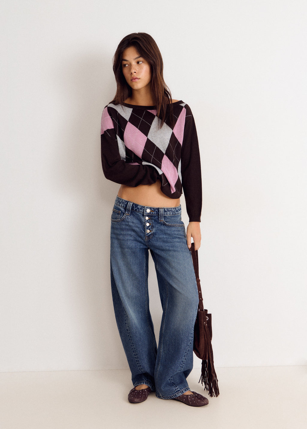 Asymmetrical diamond-patterned sweater