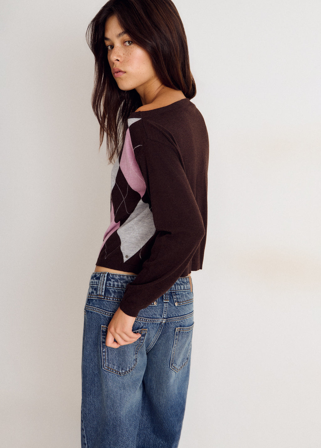 Asymmetrical diamond-patterned sweater