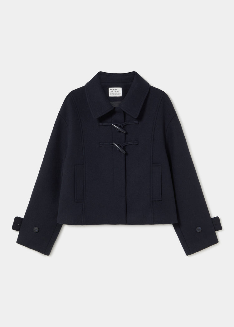 Short coat with toggle fastenings