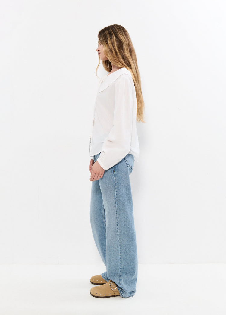 Blusa ricamata con fiocco