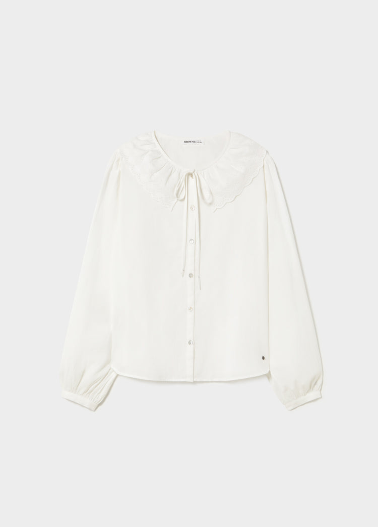 Blusa ricamata con fiocco