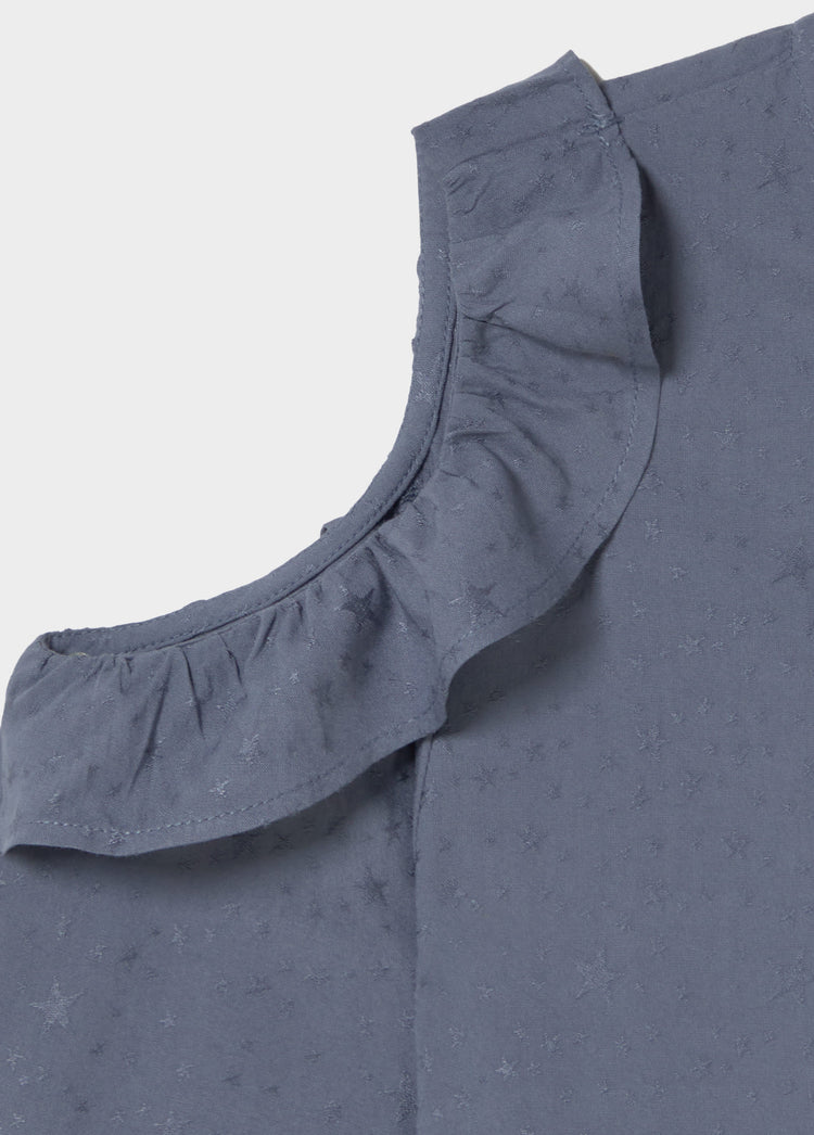 Blusa cut-out con volant