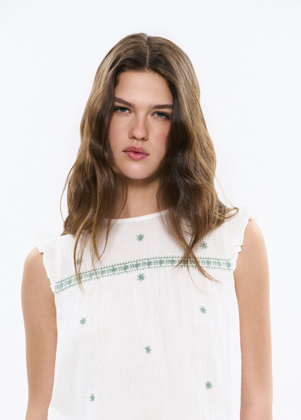 Blusa dobleta amb brodats