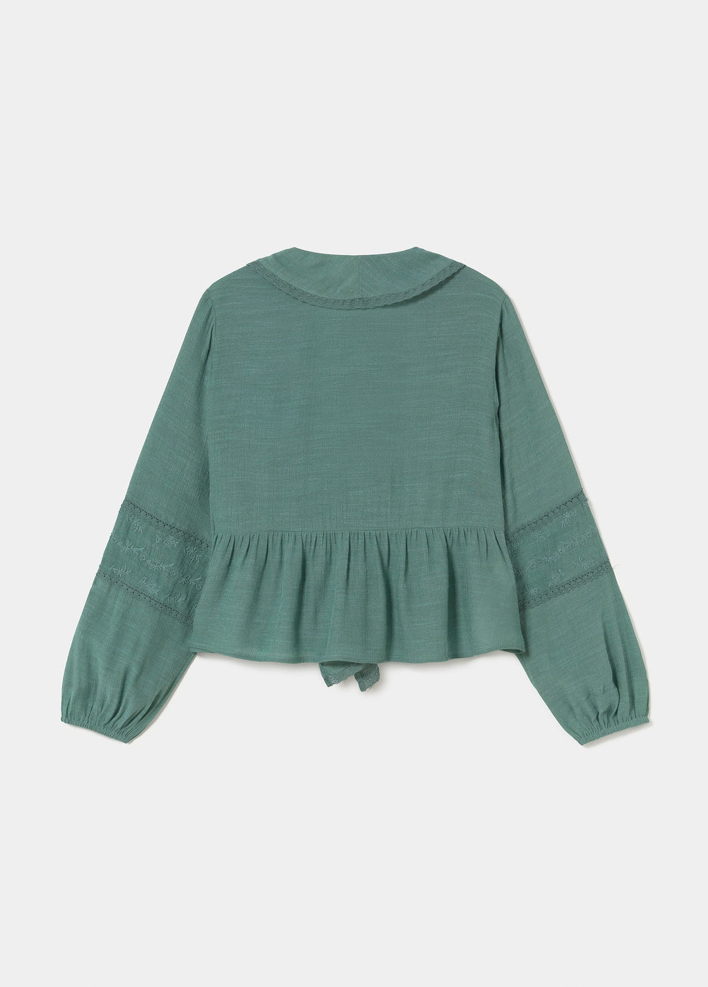 Blouse met volant en borduursels