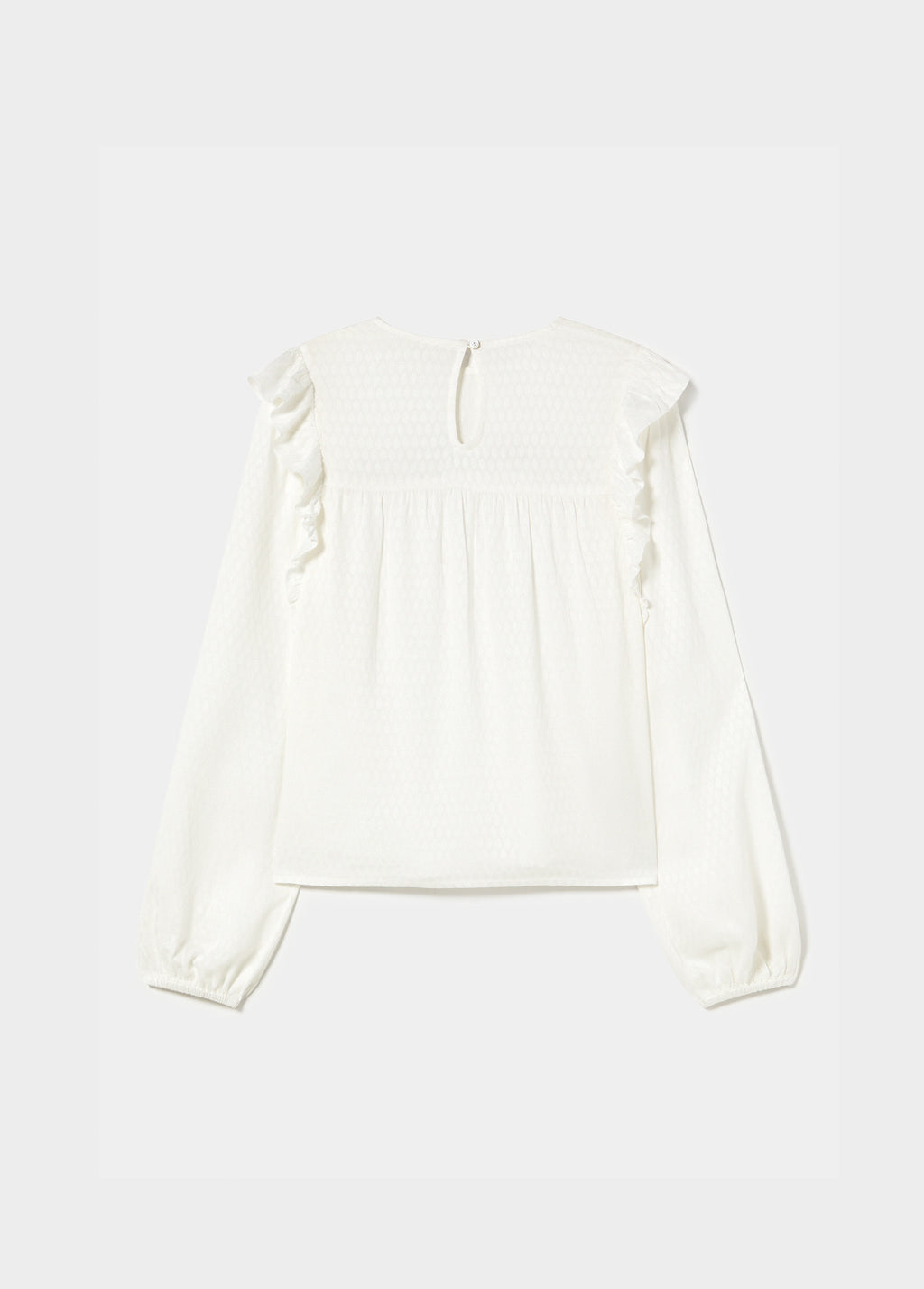 Ruffle blouse with studs