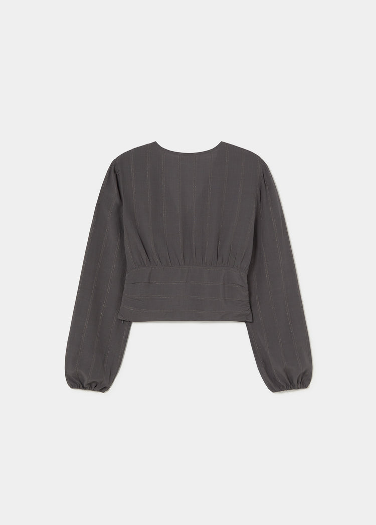 Blusa con volant