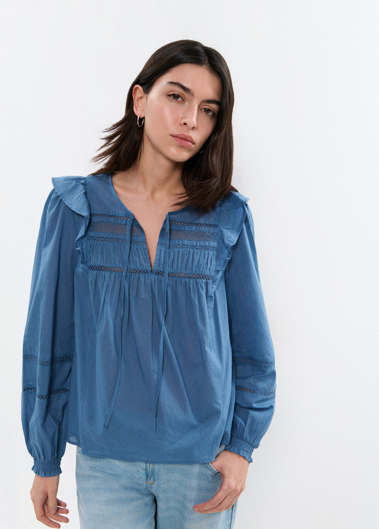 Blusa con volant
