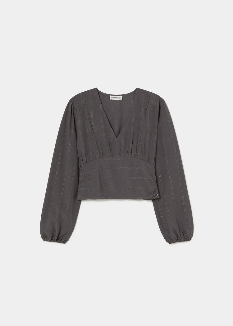 Blusa con volant