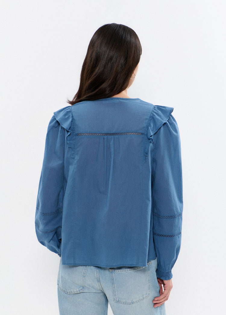 Blusa con volant