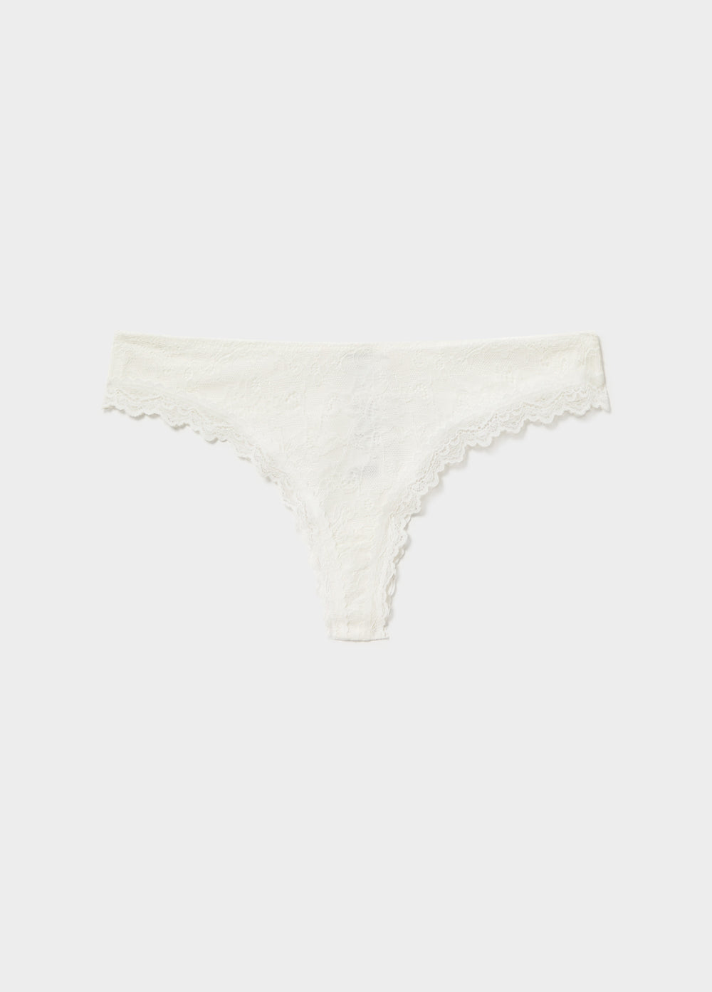 Tanga blanco de corte bajo con delicado encaje en los bordes