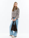Leather shoulder bag with fringes