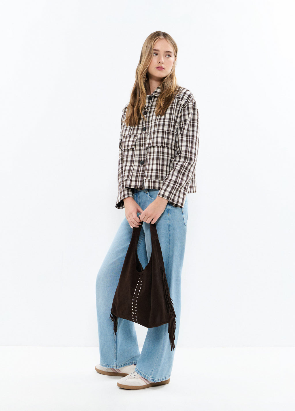 Leather shoulder bag with fringes