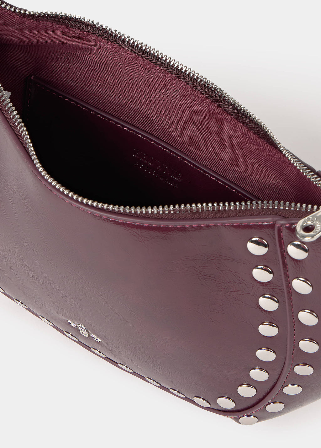 Bolso media luna tachas
