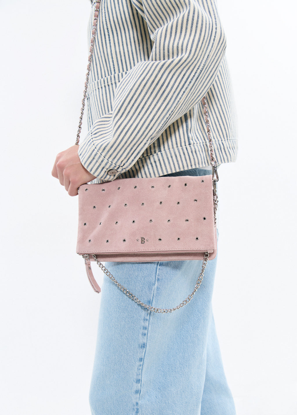 Leather eyelet flap bag