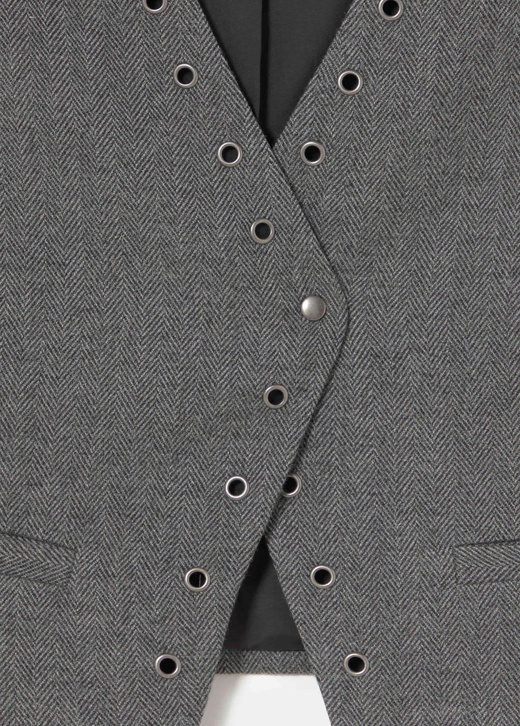 Crossed eyelet vest