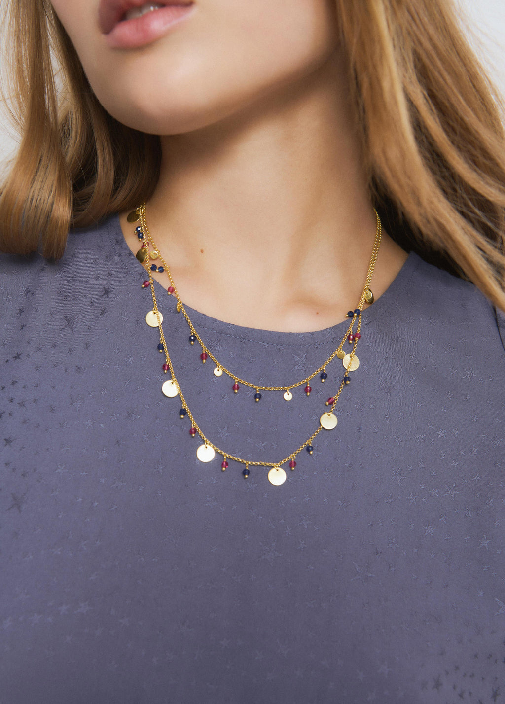 Double necklace with plates and stones