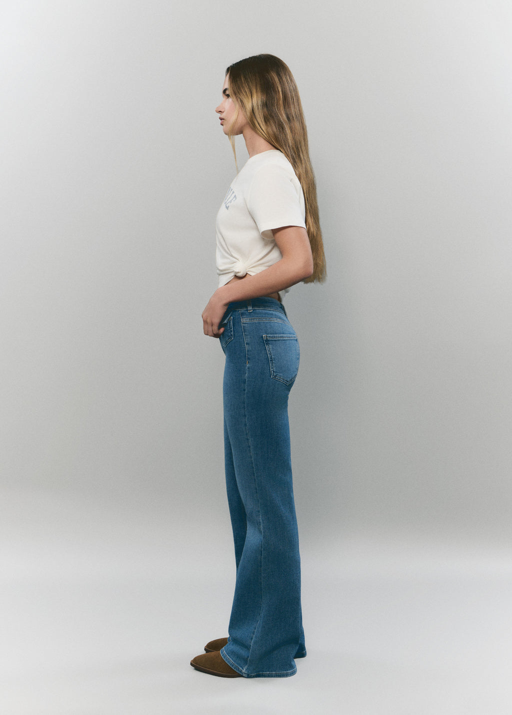 Flared jeans with front pockets