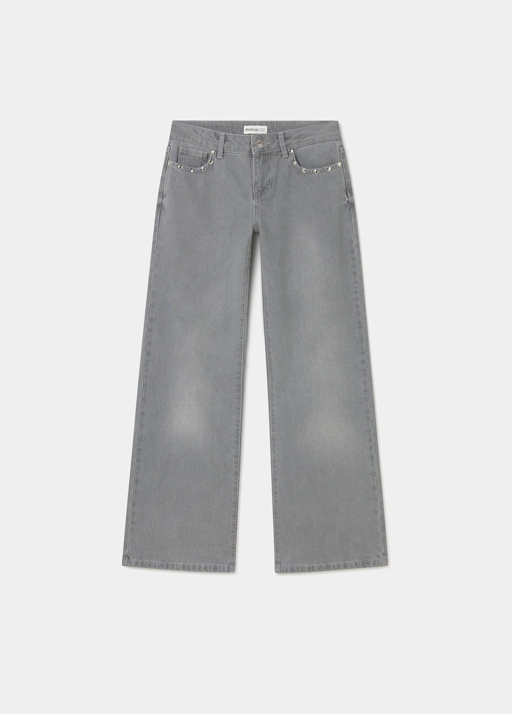 Jeans tiro bajo alas bordadas y tachas