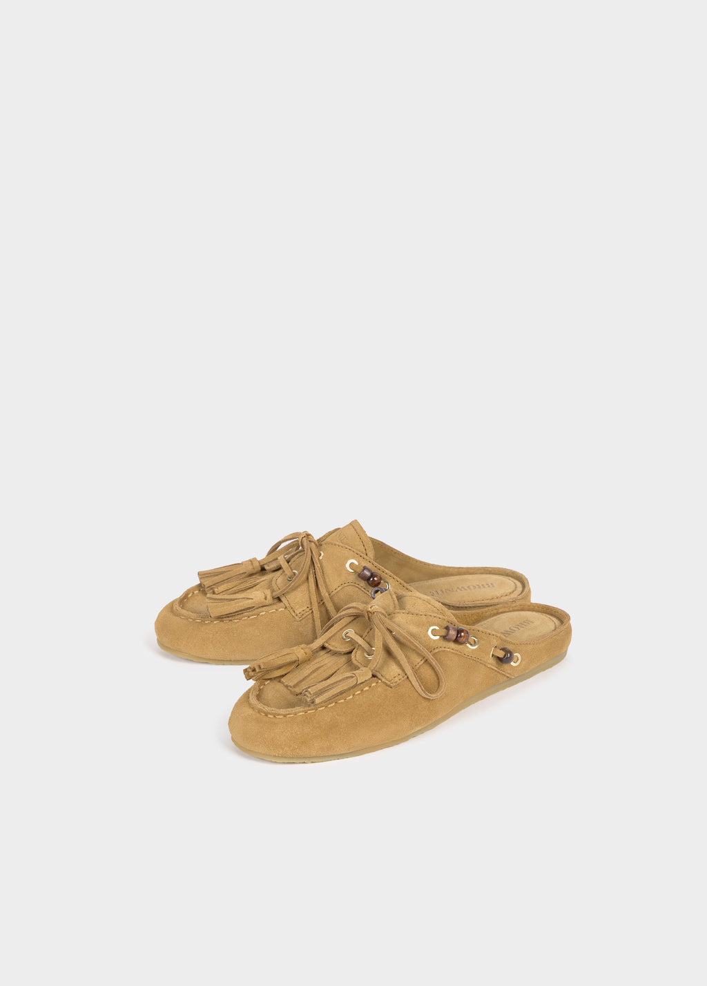 Mules mocassí amb borles de cuir