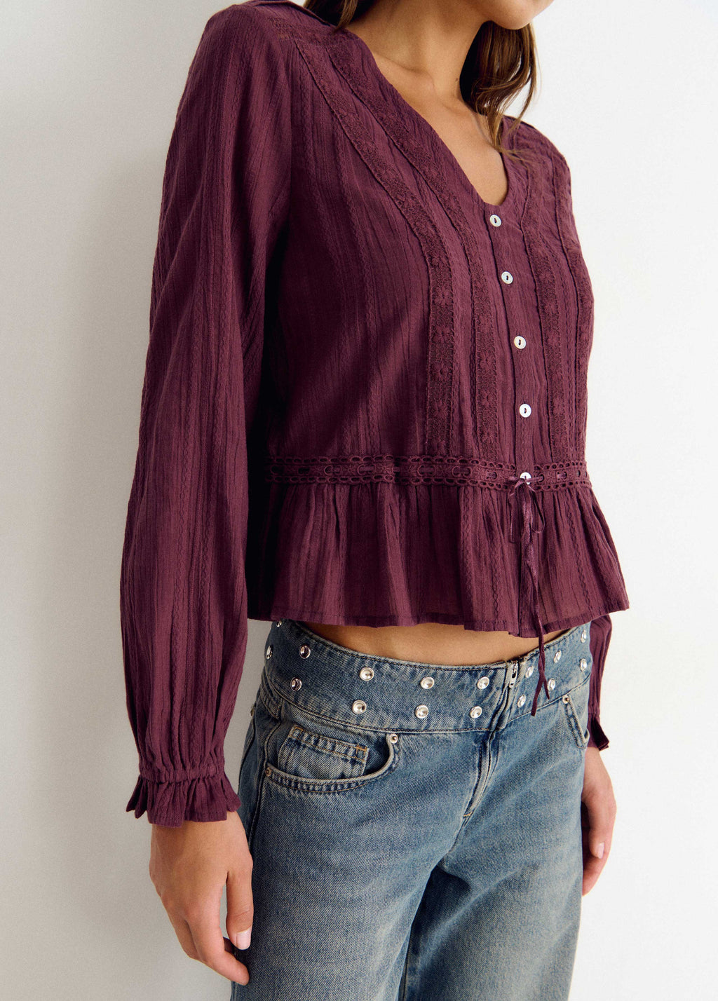 Long-sleeved ruffle blouse