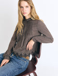 Blouse met ruitjes en geborduurde zoom