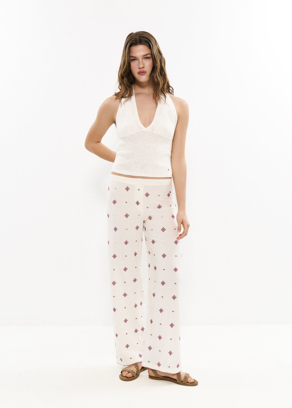 Pantalons llargs brodats amb cenefa