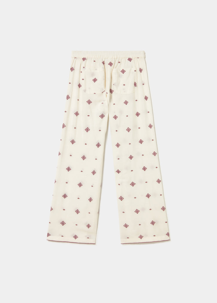 Pantalón largo bordado cenefa