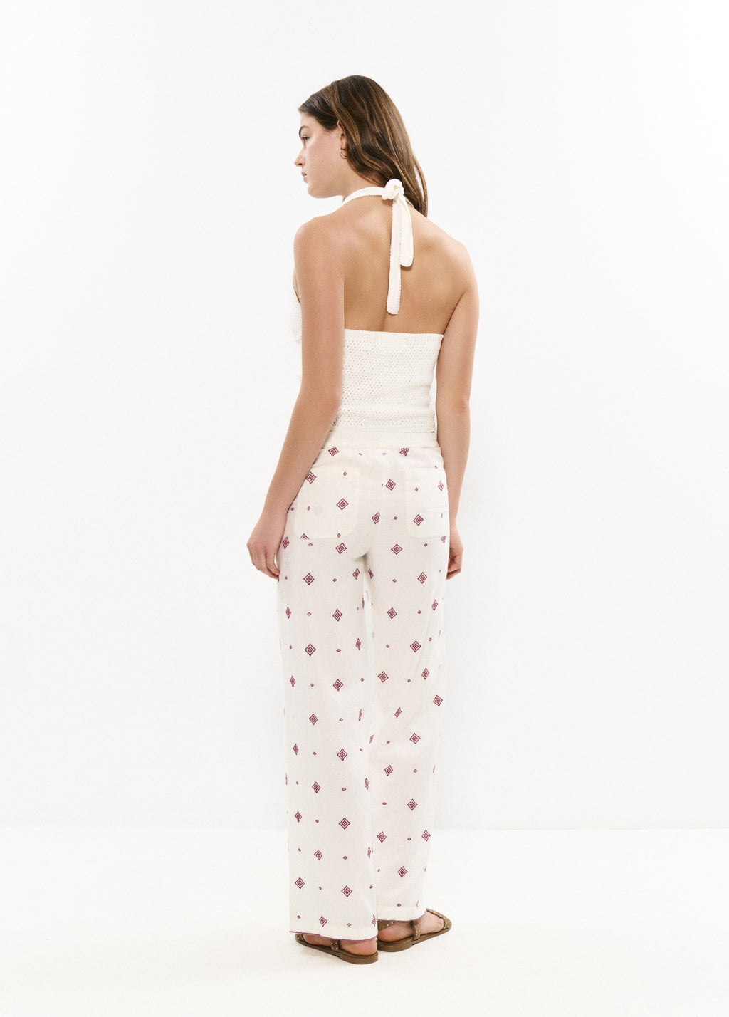 Pantalons llargs brodats amb cenefa