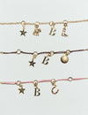 Pulsera cuerda charms