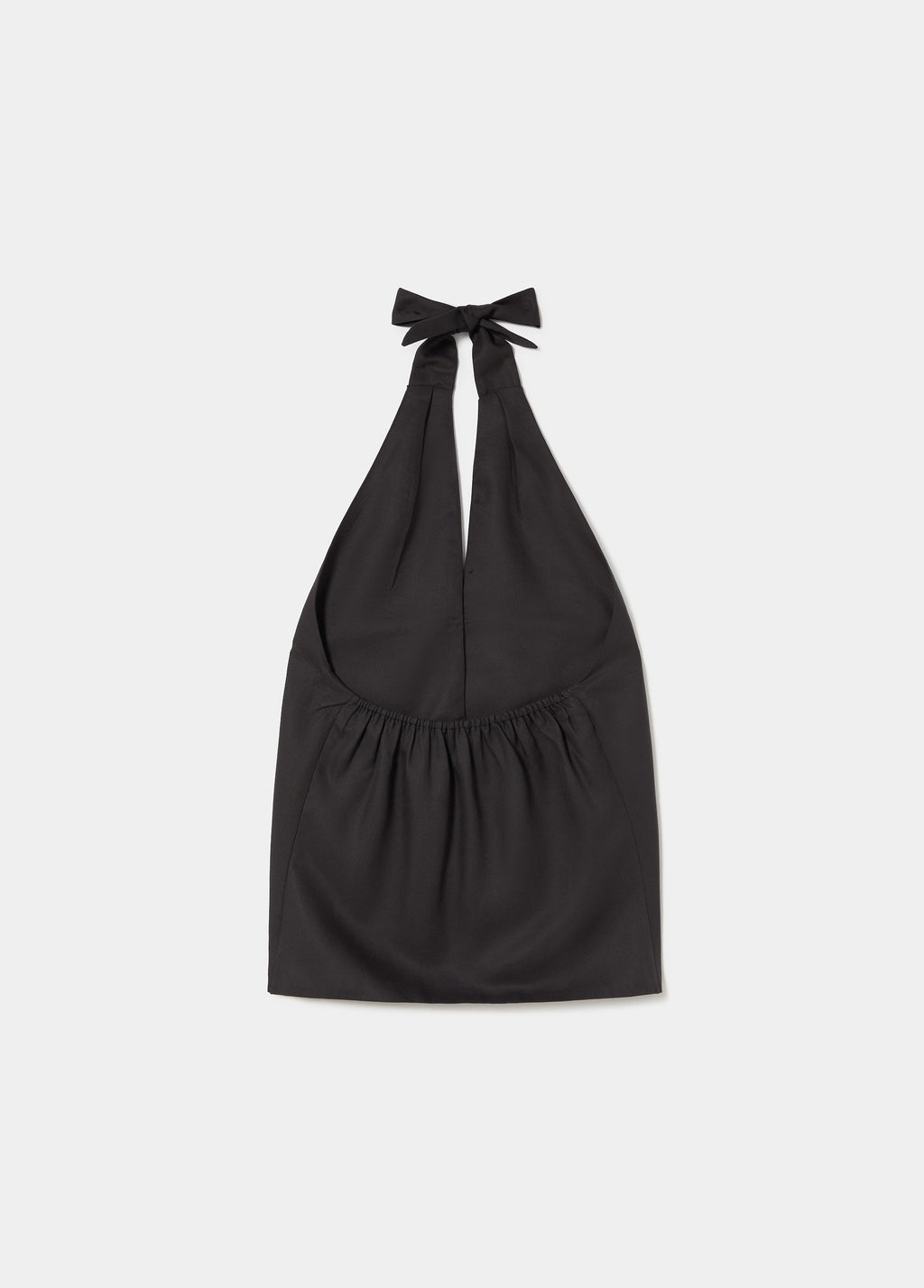 Top met geplooide knoopdetails