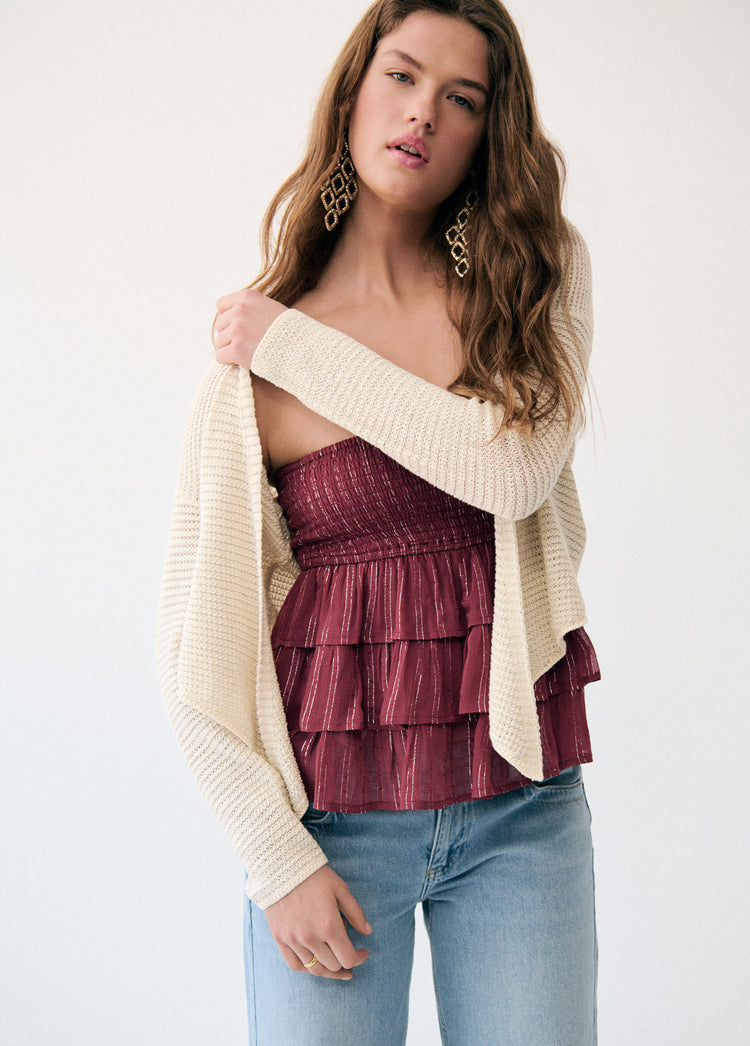 Multi-ruffle shiny top